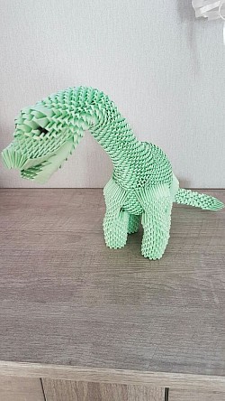 Brachiosaure au long cou - REF : 0134 - Prix : 30,00€ - Longeur + ou - 50cm - Hauteur + ou - 32cm.